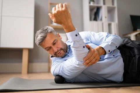 Back Trigger Point Massage Using Foam Ball Stock Photos