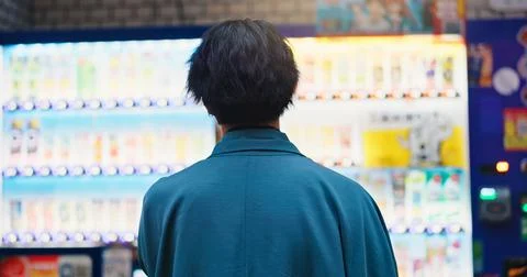Back, vending machine and thinking with man in Japan city for food decision Stock Photos