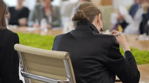 Back view of attendees focused on presentation Stock Footage 342001332