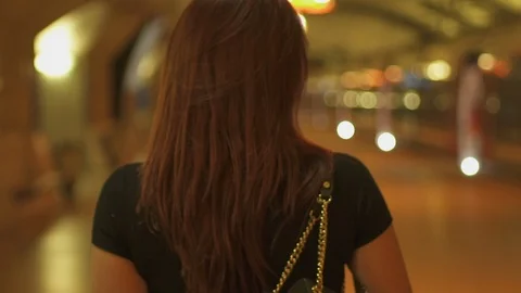 Back view of attractive caucasian redhead woman, black jacket and red hair Stock-Footage 119363365