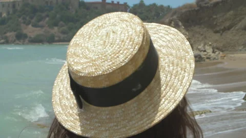 Back view of beautiful brunette model walking on tropical beach Stock Footage 140162886