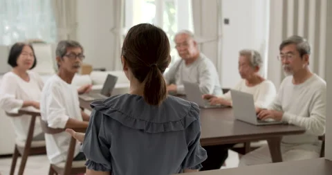 Back view of beautiful kindness young Asian nurse teaching life skill to senior. Stock Footage 148727243