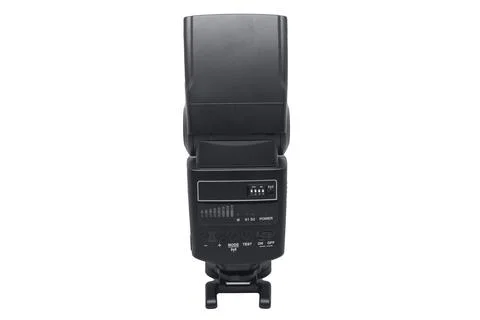 A back view of a black external camera flash speedlight showing the control.. Stock Photos