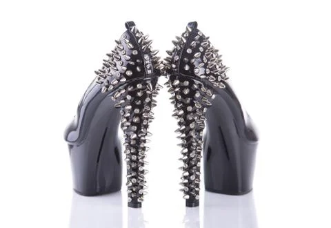 Back view on black high heel shoes with spikes Foto stock
