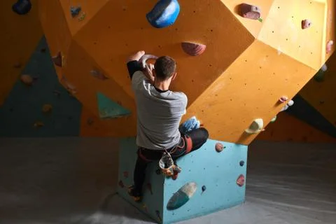 Back view of boulderer without forearm training indoors Stock Photos