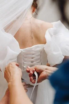 Back view bride with laced wedding dress Stock Photos