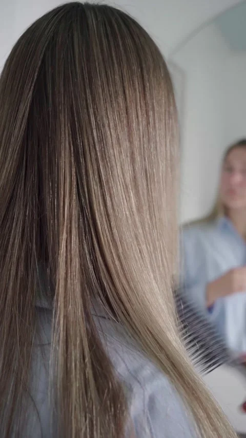 Back View Brushing Long Straight Hair for Virtual Meeting Stock Footage 341465707