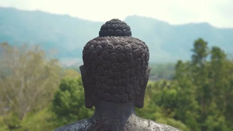 Back View of Buddha Statue Head at Borobudur Temple Indonesia Stock Footage 338275478