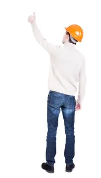 Back view of builder in helmet shows thumbs up Stock Photos