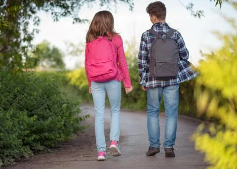 Back view children with bag Foto stock