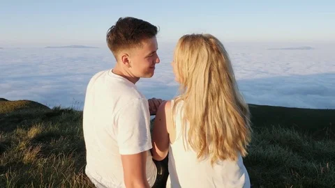 Back view. Close-up. Hikers looking at view. Video stock 81282883