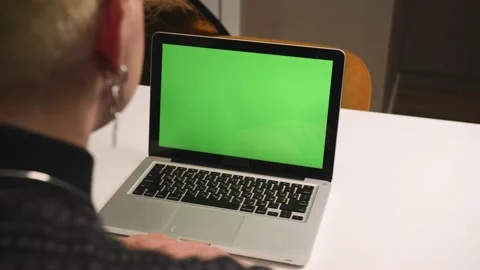 Back view. Close up homosexual man using laptop, talking on video conference Stock Footage 146908077