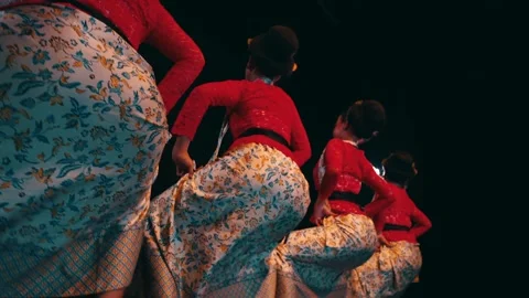 Back View Close-up of Javanese Dancers' Hips Swaying Synchronized Stock Footage 263900495