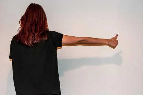 A back view close-up shot of an unrecognizable young Caucasian redhead woman  Stock Photos