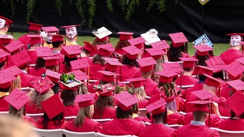 Back view of college students sitting and applauding at graduation ceremony. Stock-Footage 100002696