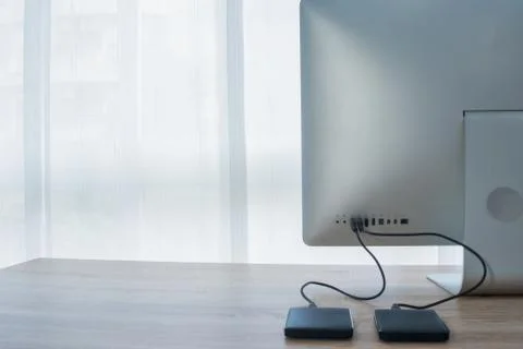 Back view of a computer with external devices connected. Stock Photos