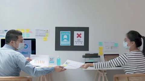 Back view of creative team staff wear face mask talking, brainstorming Stock Footage 140160880