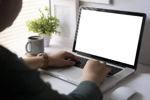 Back view creative woman working with laptop computer while sitting in mode.. Stock Photos