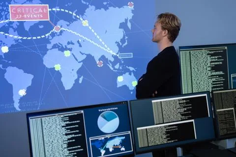 Back View in the Cyber Security Control Center Operator Working. Multiple Stock Photos