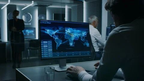 Back View of the Cyber Security Dispatchers Working on Personal Computer Stock Footage 94600865