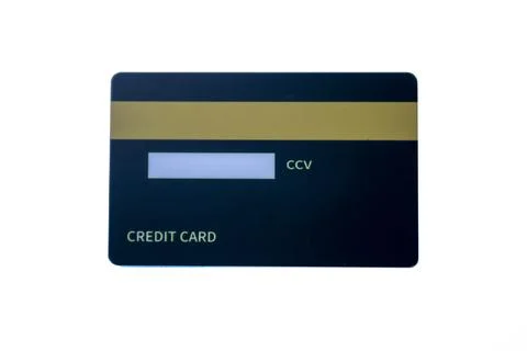Back view of a dark blue credit card with magnetic stripe and CCV panel on .. Stock Photos