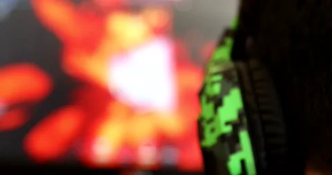 Back view of dependent gamer boy with headphone 2 스톡 동영상 140915625