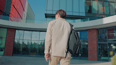 Back view of a The Determined College Student Outdoor Learning Stock Footage 252540221