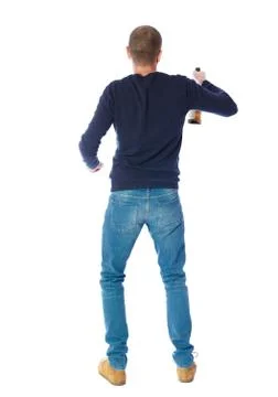 Back view of drunk man with  bottle  wine. drinking young guy Stock-Fotos