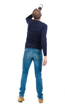 Back view of drunk man with bottle wine. drinking young guy Back view of d... Stock Photos