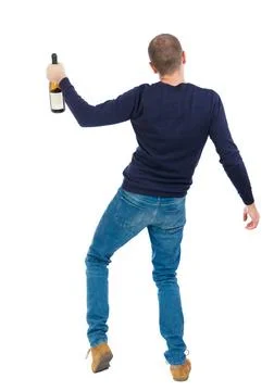 Back view of drunk man with bottle wine. drinking young guy Back view of d... Stock Photos