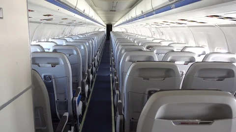 Back view on empty passenger saloon on the flight Stock Footage 92174278