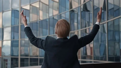Back view of Extremely Happy Successful Businessman becoming Win, making sign of Stock Footage 145282830