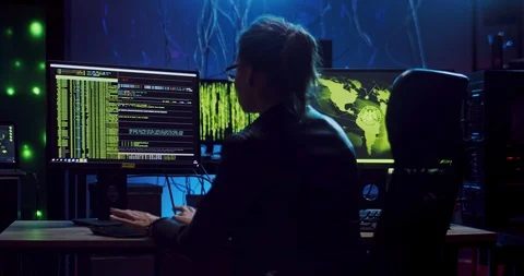 Back view on the female Caucasian software developer in glasses working over Stock Footage 124346270