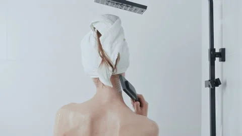 Back view female model showering Stock Footage 207468408