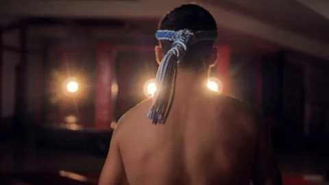 A back view on a fighters head with a mongkon on. Stock Footage 84293284