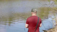 Fisherman on the Pond. Young Guy with Dreads in Glasses in a T-shirt  Fishing Fish with Rod. Stock Video - Video of equipment, outdoor: 118905975