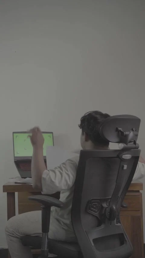 Back view of freelancer in front of laptop Stock Footage 320060563