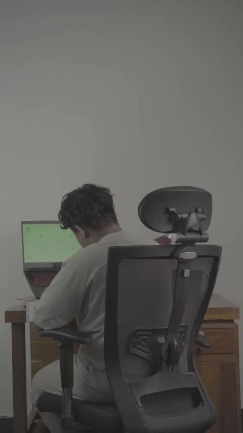 Back view of freelancer in front of laptop Stock Footage 320246027