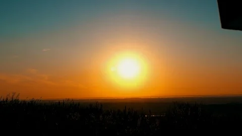 Back view friends stroll on field rising sun Stock Footage 123963610
