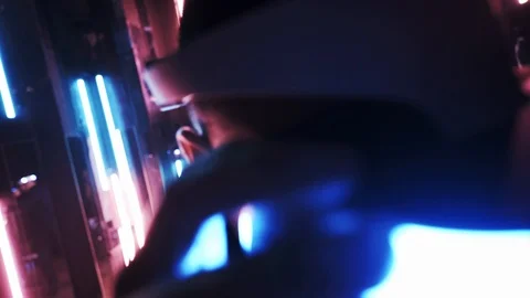 Back view gamer in VR headset in space with neon light Stock Footage 103630477