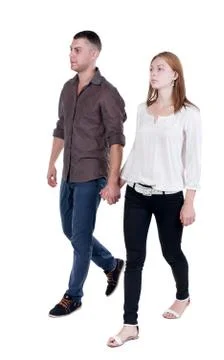 Back view going couple in shorts Foto stock