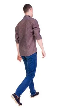 Back view of going  handsome man in jeans and a shirt Stock Photos