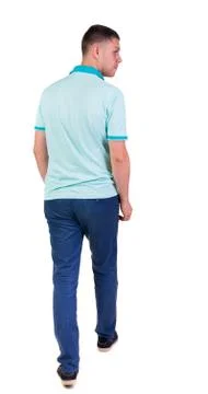 Back view of going  handsome man in jeans and a shirt Foto stock