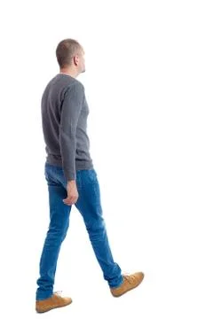 Back view of going  handsome man Stock Photos