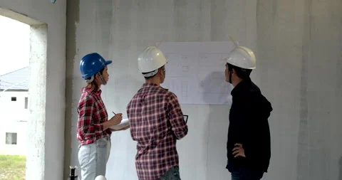 Back view group of building architect construction engineer have meeting Stock Footage 146681212
