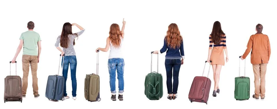 Back view of group  with  suitcase Stock-Fotos