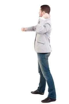 Back view of guy funny fights waving his arms and legs Stock Photos