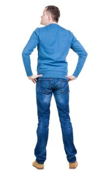 Back view of handsome man in blue pullover looking up Stock Photos