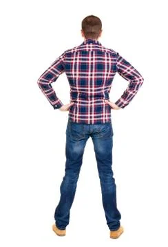 Back view of handsome man in checkered shirt  looking up Foto stock