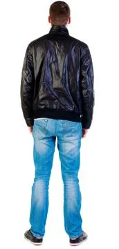 Back view of handsome man in jacket  looking up Foto stock